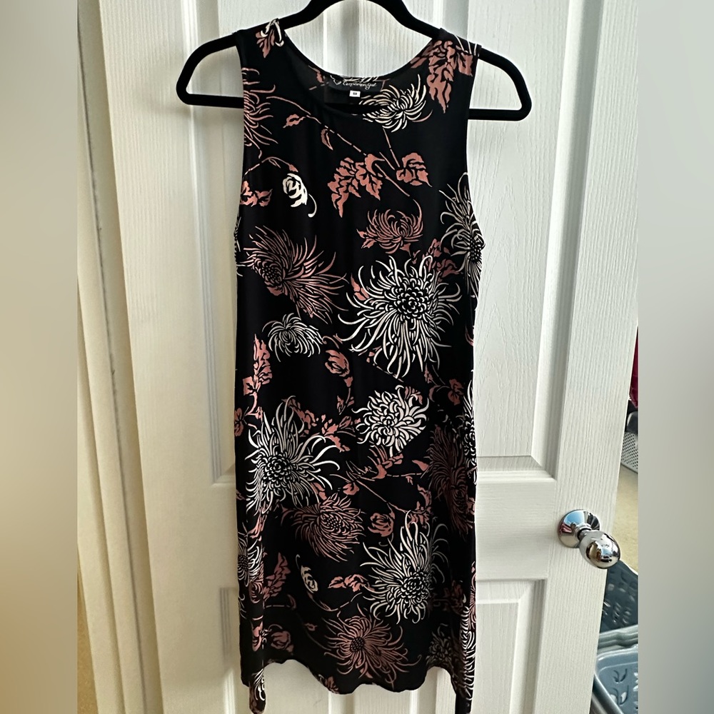 Cinnamon Girl Small Made in Hawaii.  Black floral print.